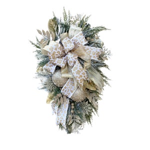 elegant gold and cream christmas swag for front door, modern christmas holiday decor, leopard print ribbon swag, frosted leopard christmas