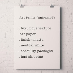 May include: A white sheet of paper with black text describing the features of art prints. The text reads: "Art Prints (unframed) luxurious texture art paper finish: matte neutral white carefully packaged fast shipping"