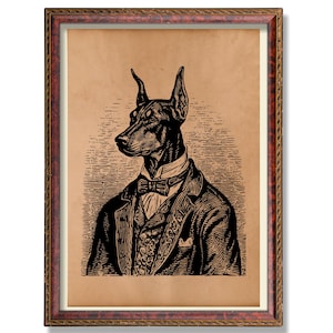 May include: A framed vintage-style print of a Doberman Pinscher in a suit and bow tie. The black and white illustration is set against a tan background, framed in a decorative brown and gold frame. The dog is depicted in a dignified pose.