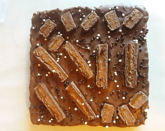 Mars Bar Rice Krispie Slab topped with Belgian Milk Chocolate, Mars Bar slices and Chocolate Sprinkles