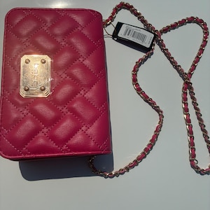 bebe BRAND NEW chic pink crossbody bag with gold embellishments