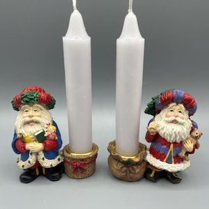 Set Of 2 Resin Santa Christmas Candlestick Holders