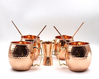 Juego de tazas de cobre martillado para Moscow Mule: 4 tazas con 4 pajitas y 1 medidor.
