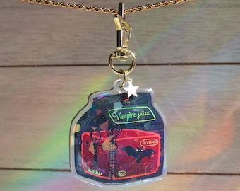 Portachiavi in resina epossidica con glitter olografico Vampire Juice