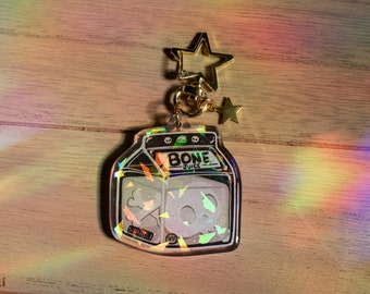 Portachiavi in resina epossidica con glitter olografico Bone Juice