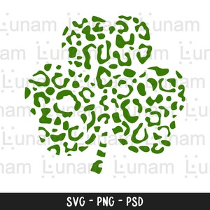 May include: Green shamrock with a leopard print pattern.