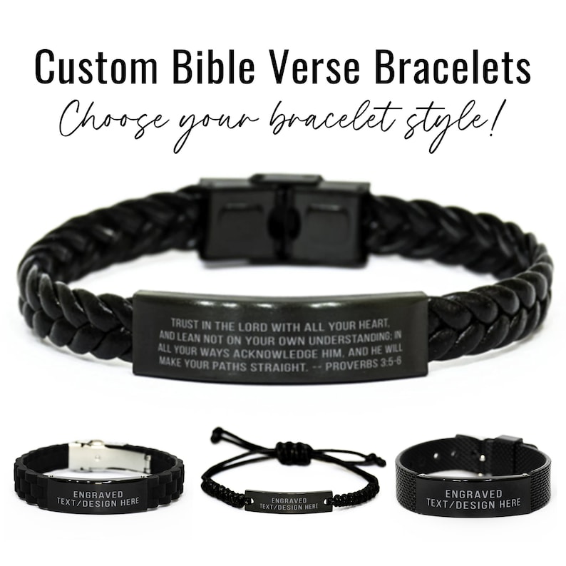 May include: Three black leather bracelets with metal accents. The top bracelet features a black metal plate with the text "TRUST IN THE LORD WITH ALL YOUR HEART. AND LEAN NOT ON YOUR OWN UNDERSTANDING: IN ALL YOUR WAYS ACKNOWLEDGE HIM. AND HE WILL MAKE YOUR PATHS STRAIGHT. PROVERBS 3:5-6". The other two bracelets have a blank metal plate with the text "ENGRAVED TEXT/DESIGN HERE".