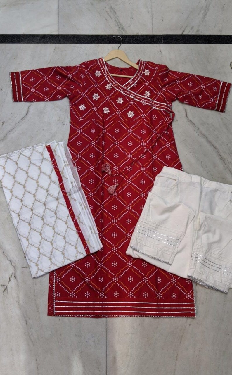 New Launch Karwa Chauth Special Dress FOr Women Our new Ethnic suit is all set to perk up your wardrobe this season Bandhej Red kurti