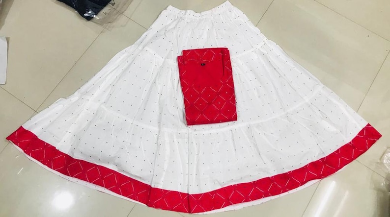 Reyon Kurti With Mirror WorkWith Full Flair Cotton Skirt Gift urself these trendy n comfortable stylish look this designer Kurti With Skirt