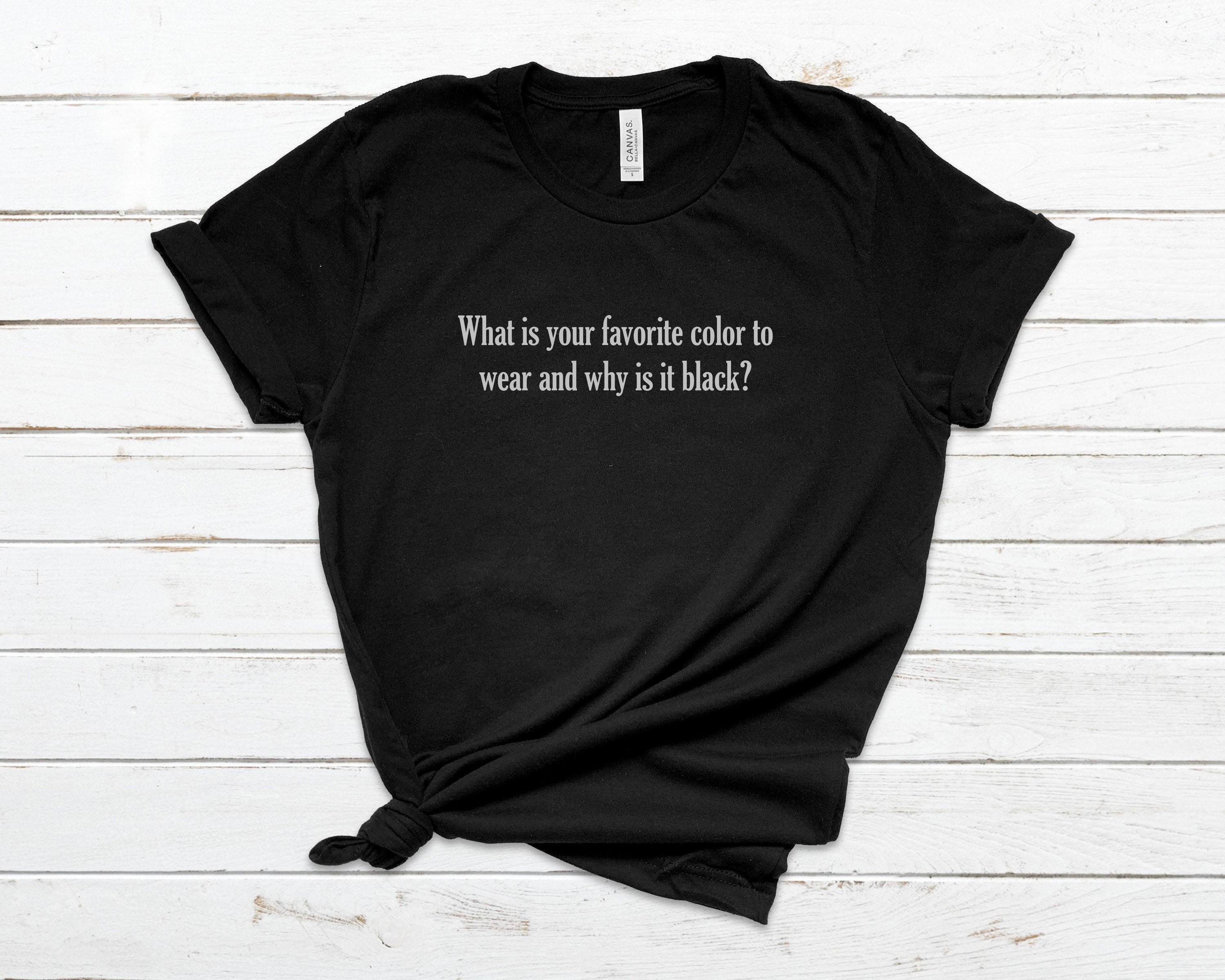 green and black graphic tee