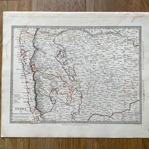 May include: An antique black and white engraved map titled India III Bombay Presidency, featuring detailed geographical markings, regional borders, and a legend. The paper shows signs of age with light discoloration along the edges.