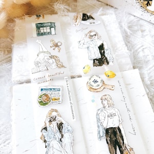 May include: A set of four clear sticker sheets with watercolour illustrations of women wearing different outfits and accessories. The stickers feature quotes such as "Collect beautiful moments" and "Life is a collection of moments".