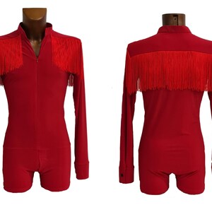 May include: Red long-sleeved dance leotard with a zip at the front and red fringe trim around the neckline.