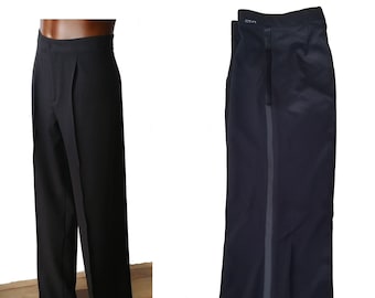 May include: Black formal trousers with a satin stripe down the side seam. The trousers have a pleated front and a zip fly.