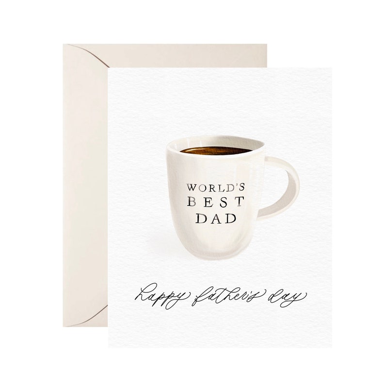 May include: White coffee mug with the text "World's Best Dad" and the words "Happy Father's Day" written in cursive.