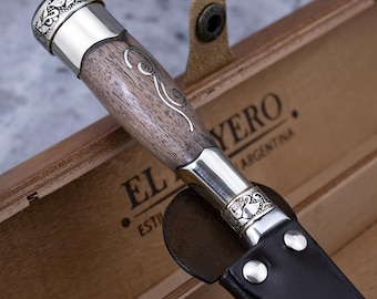 Wooden-handled knife. Nickel-plated wooden-handled knife. Wooden-handled knife in a box. Made in Argentina.