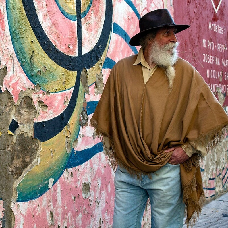 Alpaca poncho. Handwoven alpaca poncho. Very delicate handcrafted work made in Argentina. Very soft, light, and warm.