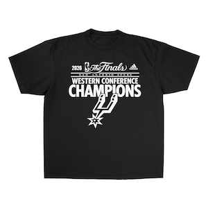May include: A black short-sleeve t-shirt featuring white screen-printed text and graphics. The design includes the NBA logo, the text 2026 The Finals, the Adidas logo, San Antonio Spurs, Western Conference Champions, and the San Antonio Spurs logo.