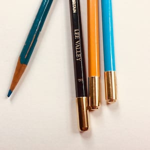 Pencil-Crown (pencil performance enhancer) for drawing, sketching, mandala coloring