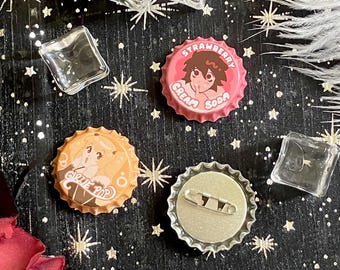 Pins de tapones de botellas del Libro de la Muerte