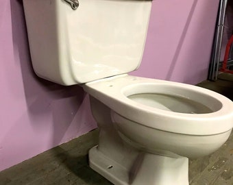 Light gray vintage toilet designer piece