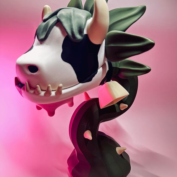 The Sims cow plant desk figure. Partially hand painted. 9” tall 3D printed. Fan art.