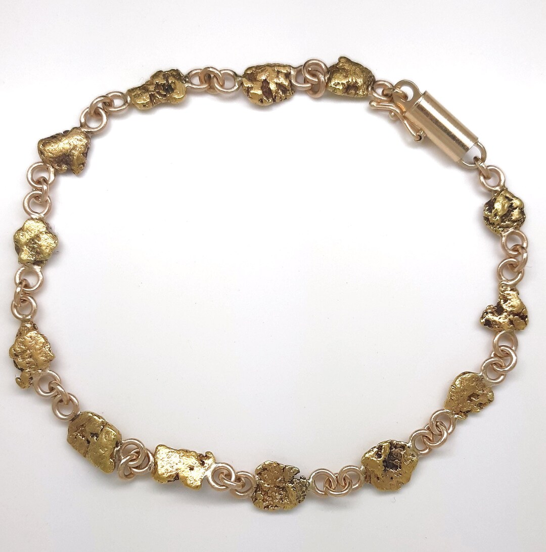 A Lady’s Estate 14k Yellow Gold Line Bracelet Set With Genuine Montana ...
