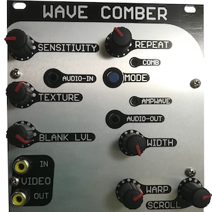 May include: A silver and black Wave Comber audio effects module with knobs, buttons, and jacks. The module has labels for Sensitivity, Repeat, Comb, Audio-In, Mode, Texture, Ampwave, Audio-Out, Blank Lvl, Width, In, Video, Out, Warp, Scroll, and Chroma Cauldon.