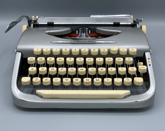 Royal 260  rare typewriter with radio Toho Denki Seiki Co.