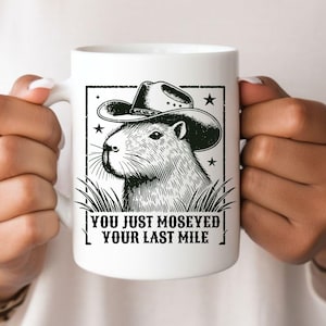 Capybara Cowboy Coffee Mug Black Graphic Western Theme Tea Cup Moseyed Your Last Mile Funny Quote Cowgirl Yee Haw Howdy Partner Sheriff