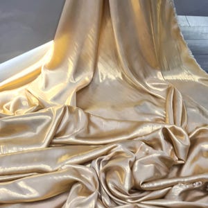 0.5 sample liquid gold shimmer satin smooth silky elegant liquid  bridal wedding shimmer satin Fabrics. By the mtr.60 wide