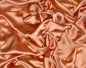 1mtr .  bright peach colour smooth silky elegant liquid  bridal wedding dress  chameuse satin Fabrics. By the mtr.60 wide