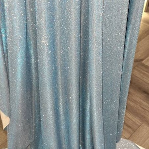 1mtr. baby blue moonlight sparkling bridal party wear dress fabric 58 inches wide. Mtr price