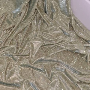 1mtr. gold &silver moonlight sparkling bridal party wear dress fabric 58 inches wide. Mtr price