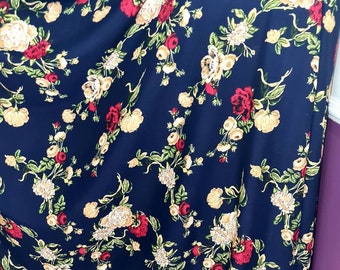 1mtr.navy blue  with multy colour flowers viscose fabric dress fabric. 58 wide . Mtr price