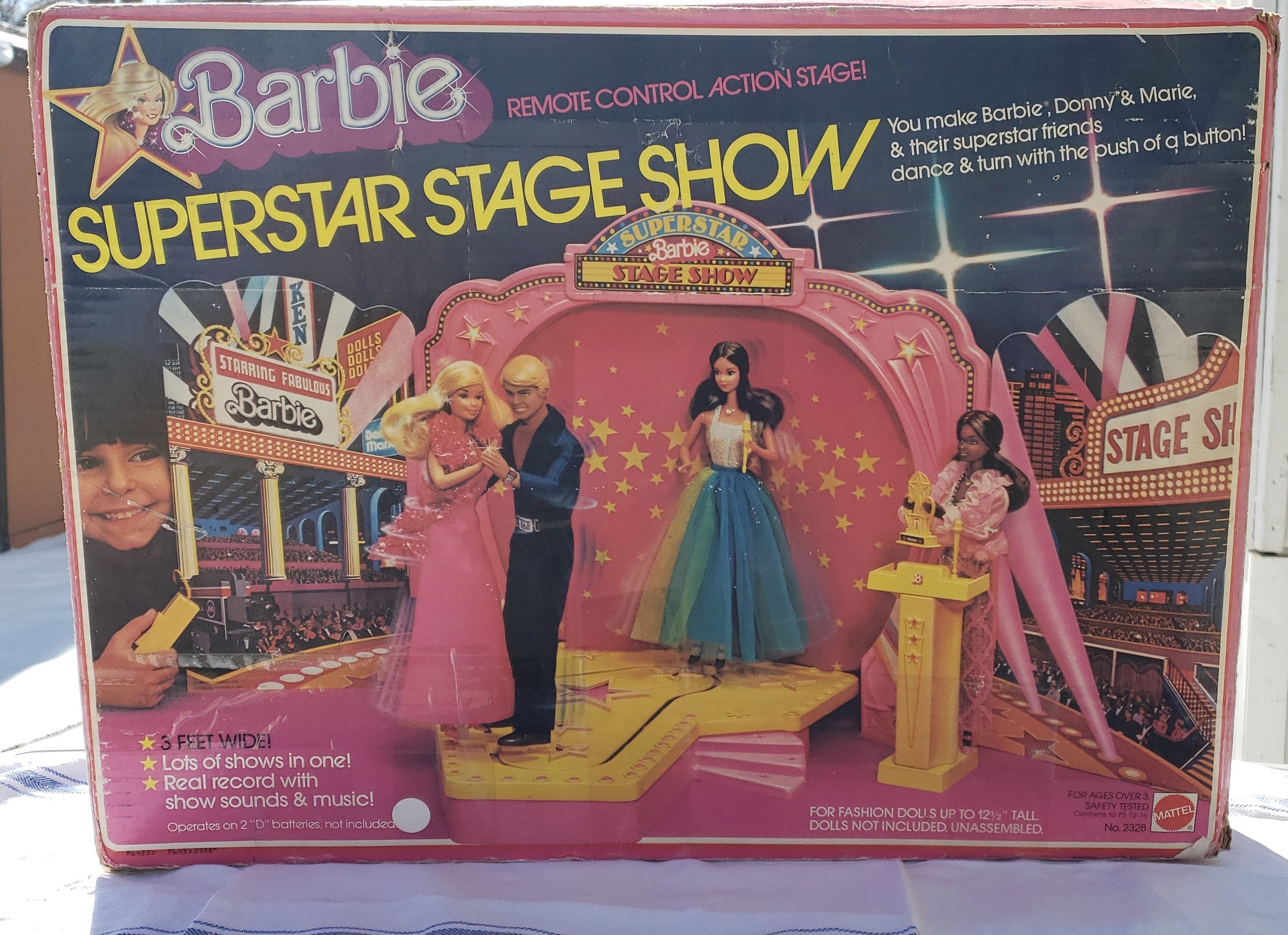 cdn./ba/rb/barbie-fashion-show-stag