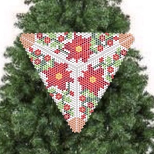 May include: A white and red triangular Christmas tree skirt with a floral pattern. The skirt is placed on a green artificial Christmas tree.