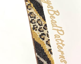 May include: A beaded bracelet with a black, white, and gold leopard print pattern. The bracelet has a gold clasp and a gold charm.