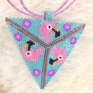May include: A triangular beaded necklace with a pink flamingo design. The necklace is made of small, colorful beads and has a silver-colored chain.