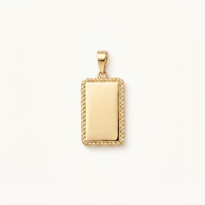 May include: A rectangular gold pendant featuring a smooth, polished centre surface framed by a textured rope-style border. The pendant includes a small, triangular gold bail at the top for attachment to a chain, showcasing a clean, metallic finish.