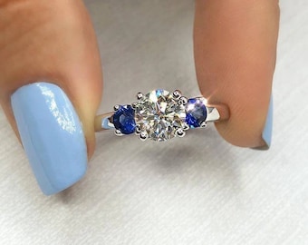 Round Moissanite diamond with side blue sapphire diamond three stone ring, 1ct round diamond ring, blue sapphire diamond ring, 1ct ring