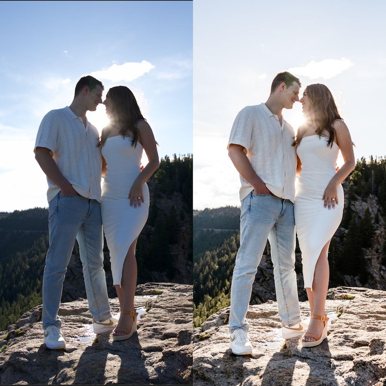 May include: A couple stands close together on a rocky cliff, silhouetted by the sun. The woman wears a white, strapless dress and the man wears a light-colored shirt and jeans. The background features a forest and a blue sky.