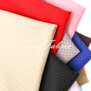May include: A variety of colors of fabric with a dotted texture. The colors include red, beige, pink, gray, blue, brown, and black.