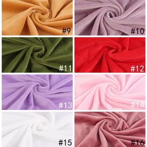 May include: Eight fabric swatches in different colors, including orange, green, red, purple, pink, white, and brown. The swatches are arranged in two rows of four, with each swatch labeled with a number from 9 to 16.
