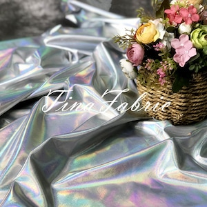 Silver Laser Fabric: Reflective Polyester Dress Material