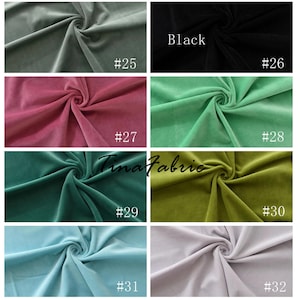 May include: A collection of eight fabric swatches in various colors, including green, blue, pink, and black. Each swatch is labeled with a number, from #25 to #32. The text "Tinafabric" is visible in the center of the image.