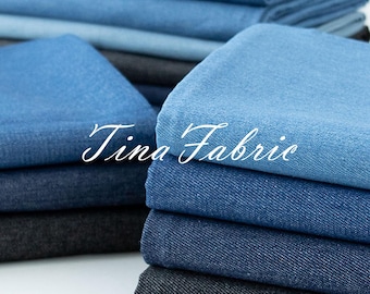 Dunne blauwe katoenen denimstof: gewassen effen kleding - op maat gesneden