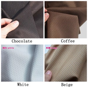 May include: Four fabric swatches in different colors: chocolate, coffee, white, and beige. Each swatch has a textured surface with small raised dots.