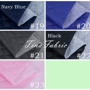 K&ouml;nnte beinhalten: F&uuml;nf Stoffmuster mit einem gesteppten Rautenmuster. Die Muster sind marineblau, schwarz, rosa, hellgr&uuml;n und grau. Jedes Muster hat eine Nummer von 19 bis 23.