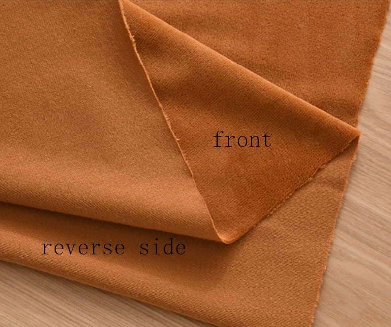 May include: A close-up of a brown fabric folded in half, showing the front and reverse side. The text "front" is written on the front side and "reverse side" is written on the reverse side.